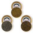 Load image into Gallery viewer, Royal Ossetra, River Beluga and Limited Edition Sevruga caviar in open tins.