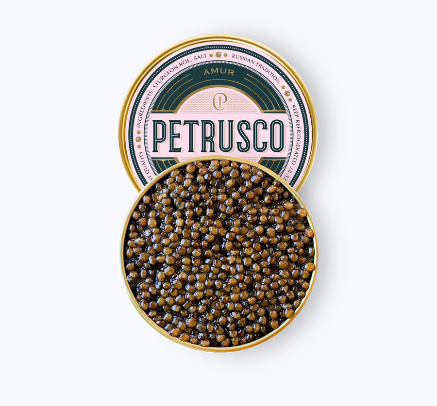 opened tin of Petrusco river beluga hybrid caviar on white backround