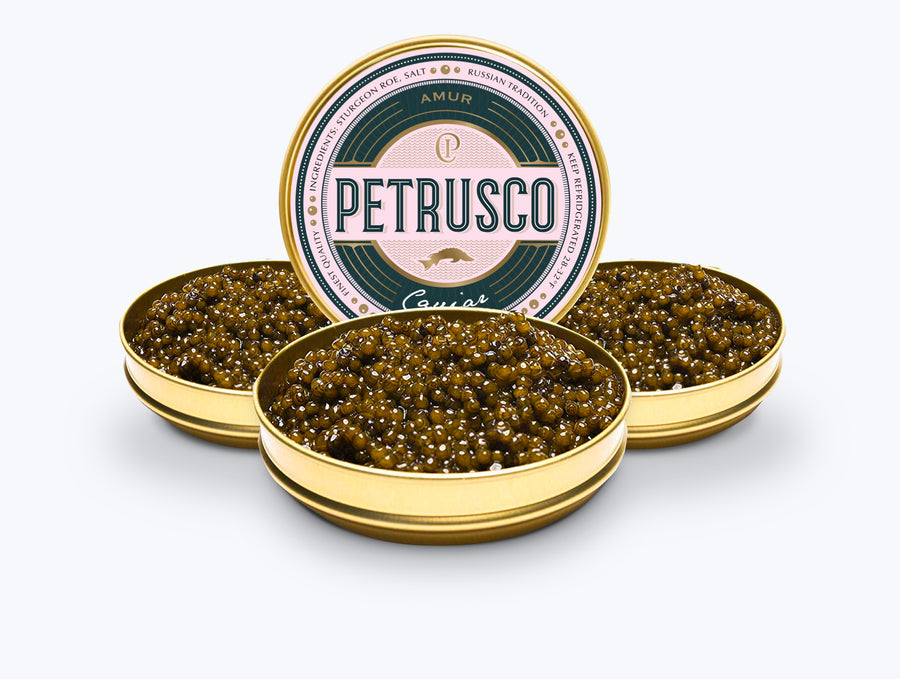 three opened tins of Petrusco river beluga hybrid caviar