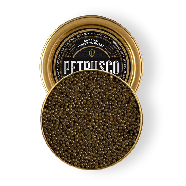 Open tin of Petrusco Caspian Ossetra Royal caviar showing glossy olive-green pearls on a white background.