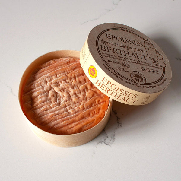 Epoisses Berthaut Cheese in AOC Burned Box displaying the French fromage that is brandy washed