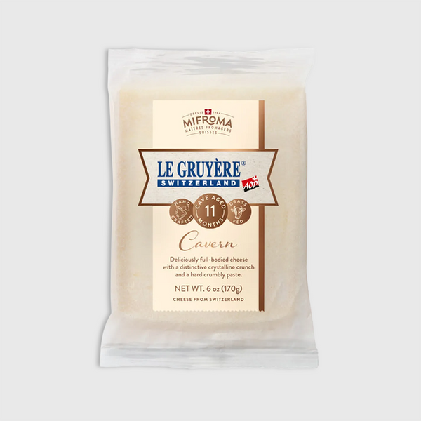 Le Gruyère cheese packaging on a white background