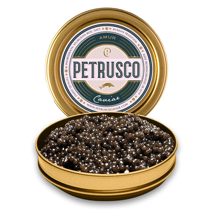 Petrusco Amur caviar in an open tin with the lid behind it.