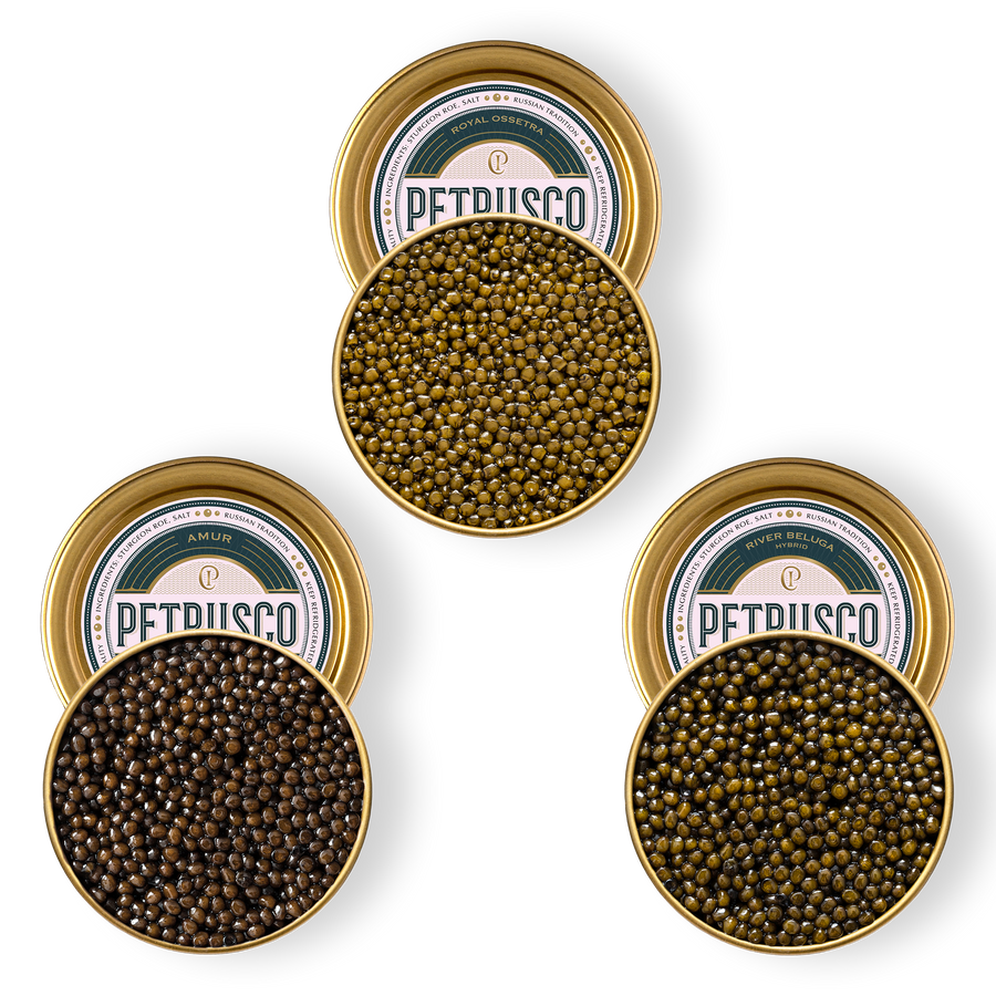 Royal Ossetra, River Beluga, and limited edition Amur caviar in open tins.