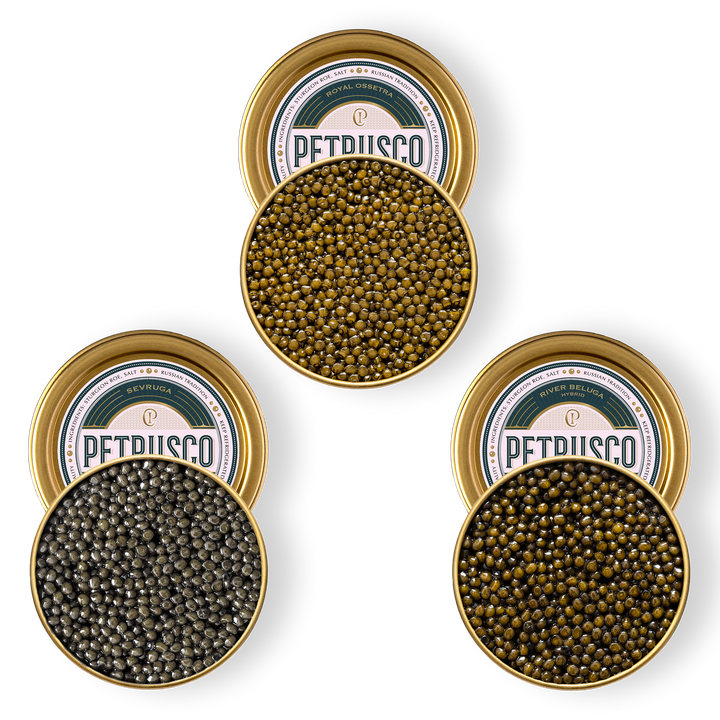 Royal Ossetra, River Beluga and  Limited Edition Sevruga caviar in open tins.