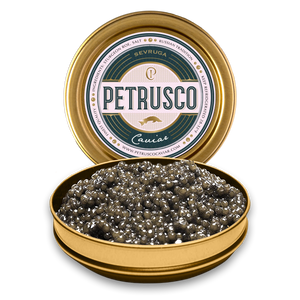 Petrusco Caviar in gold tin displayed open with fresh sturgeon roe in the open can