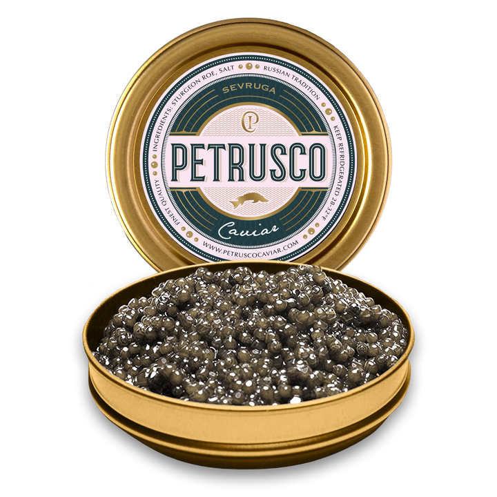 Petrusco Caviar in gold tin displayed open with fresh sturgeon roe in the open can