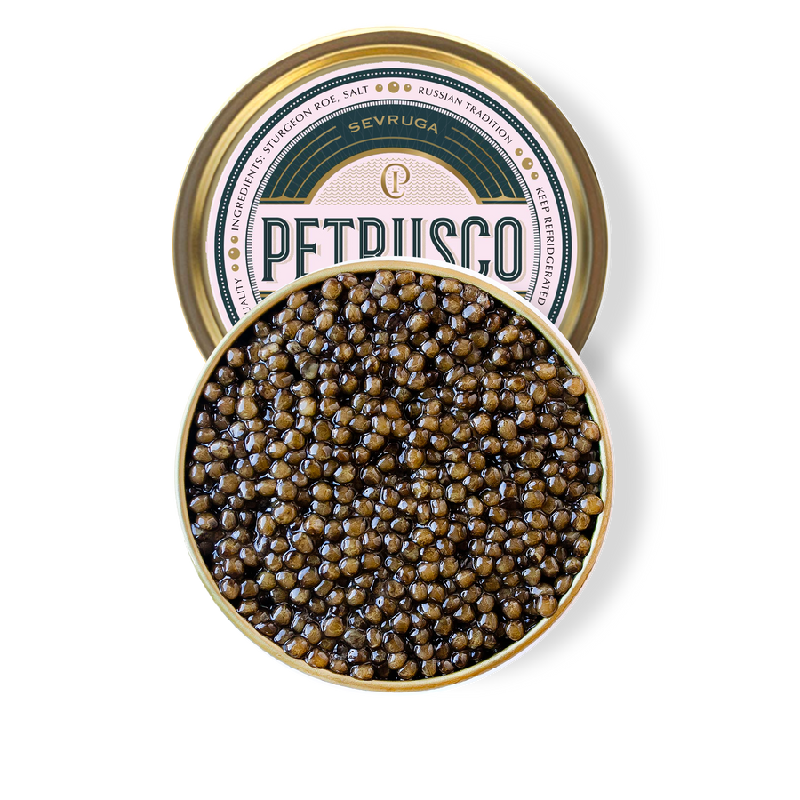 Petrusco Caviar gold and emerald tin partially hidden behind the full circle open tin of caviar displaying the fresh sturgeon roe 