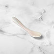 Load image into Gallery viewer, mother of pearl spoon on a marble surface

